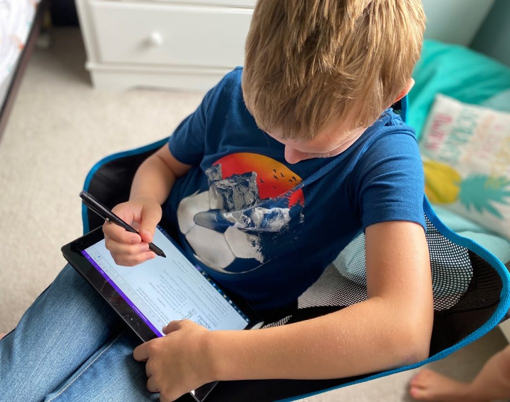 person working on tablet